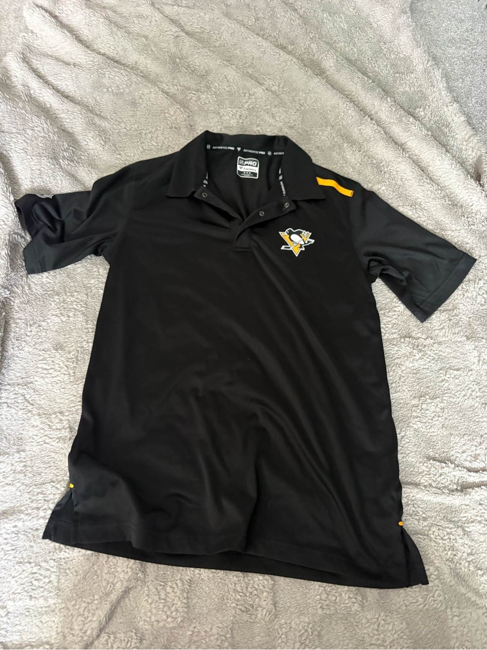 NHL Black Polo with Yellow Accent and Team Crest